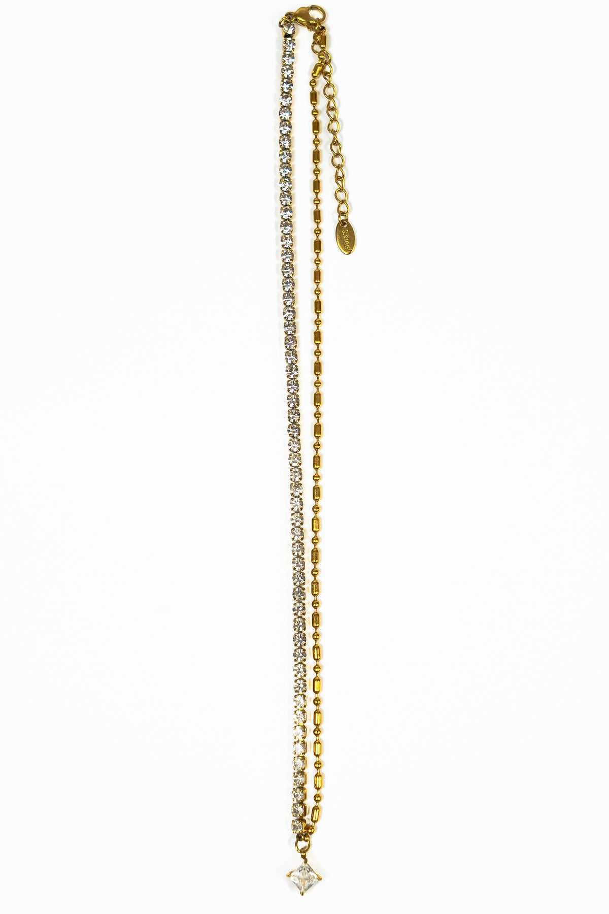 Pendentif collier spirituel strass étoile chaîne strass en zircon et chaîne en or sur fond blanc